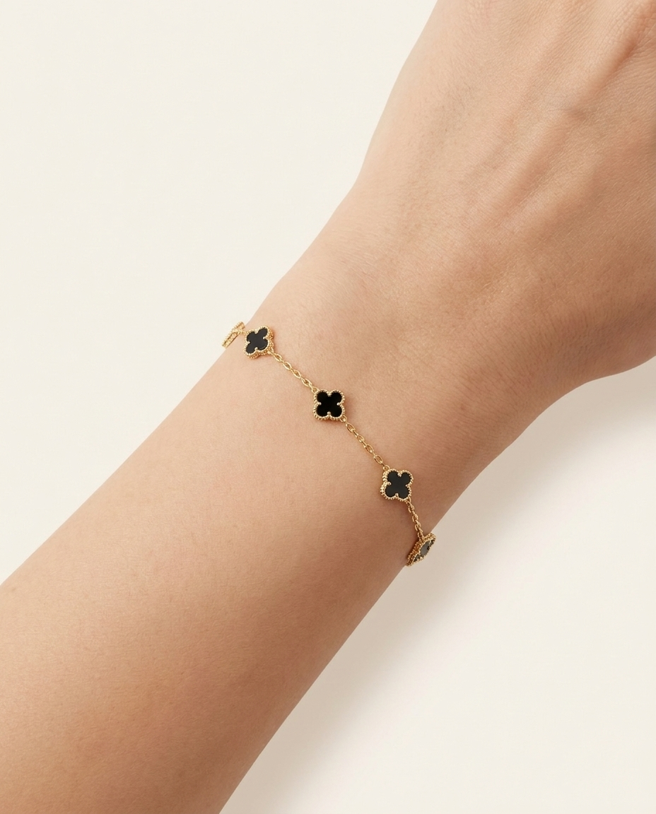 Pulsera Noir Fleur - Product shot tréboles mini fondo crema